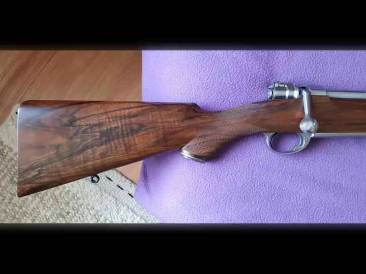 Recent walnut stock underside detail